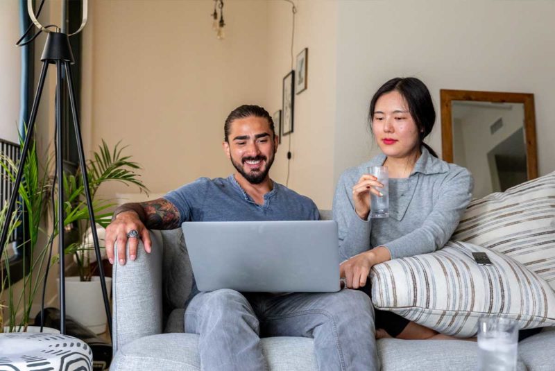 Man and woman with laptop