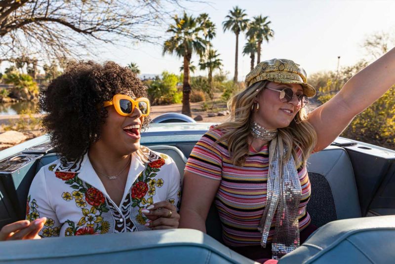 two girls in the back seat