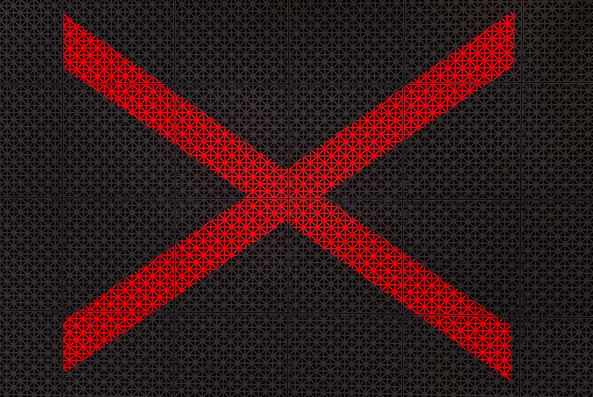 Red x on black background