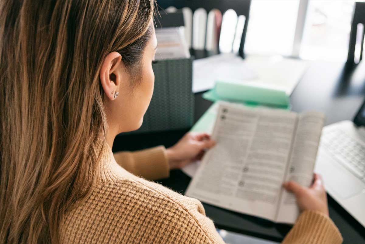 Woman reading paper