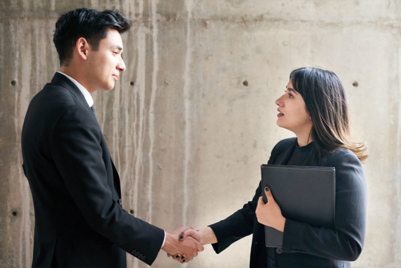 Business people shaking hands