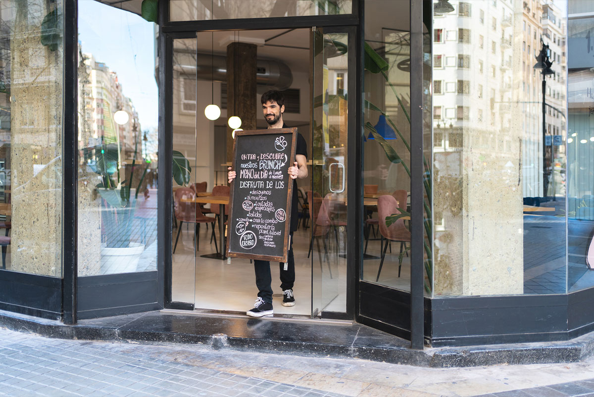 Business owner standing in their shop