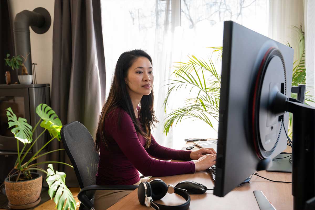 woman sitting at computer