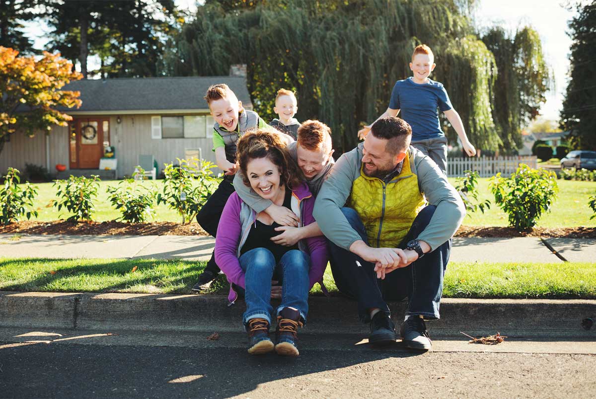 Family outside of their home