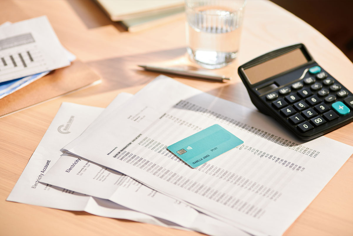 calculator and documents on a table