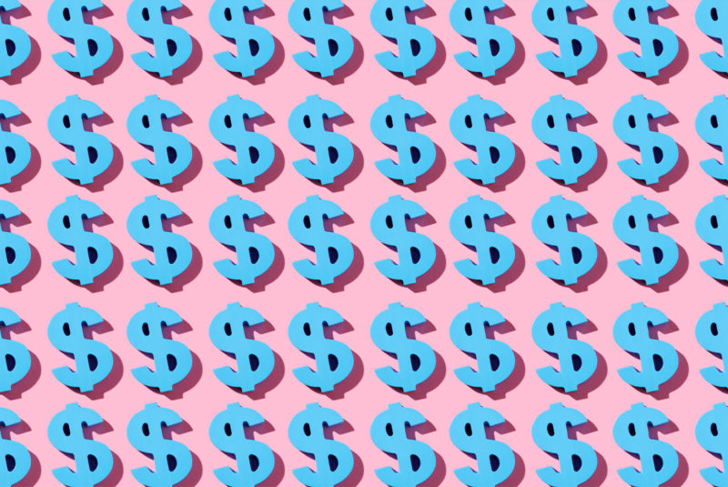 Blue dollars on pink bankground