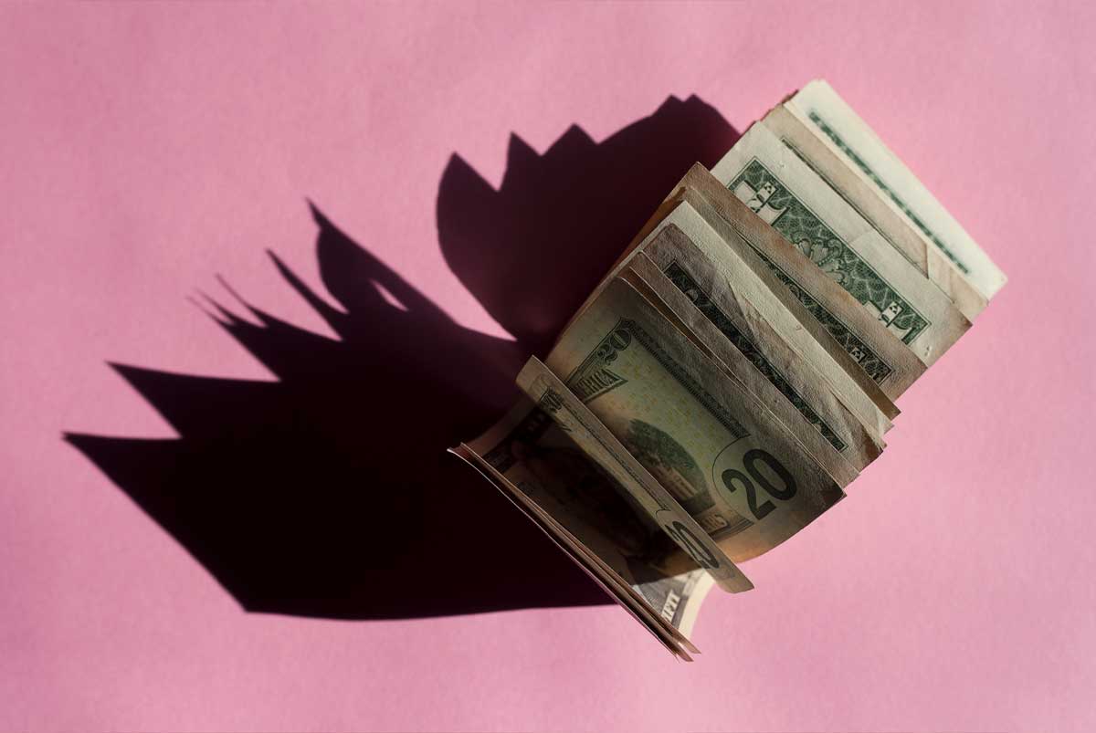 Cash on pink background