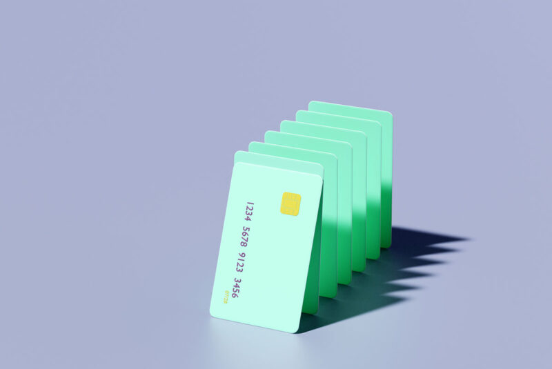 A conceptual image of multiple credit cards to imply multiple sources of debt.