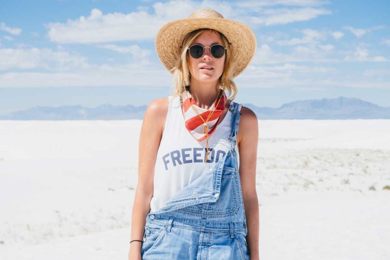 Woman in sun hat on the beach