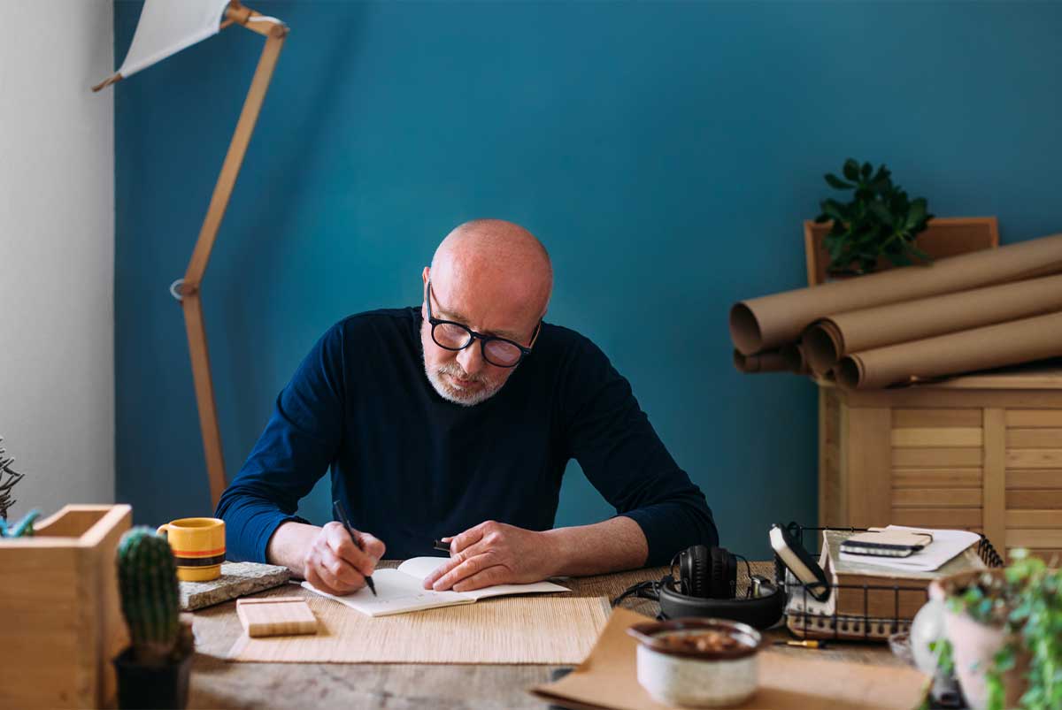 Older man working on paperwork