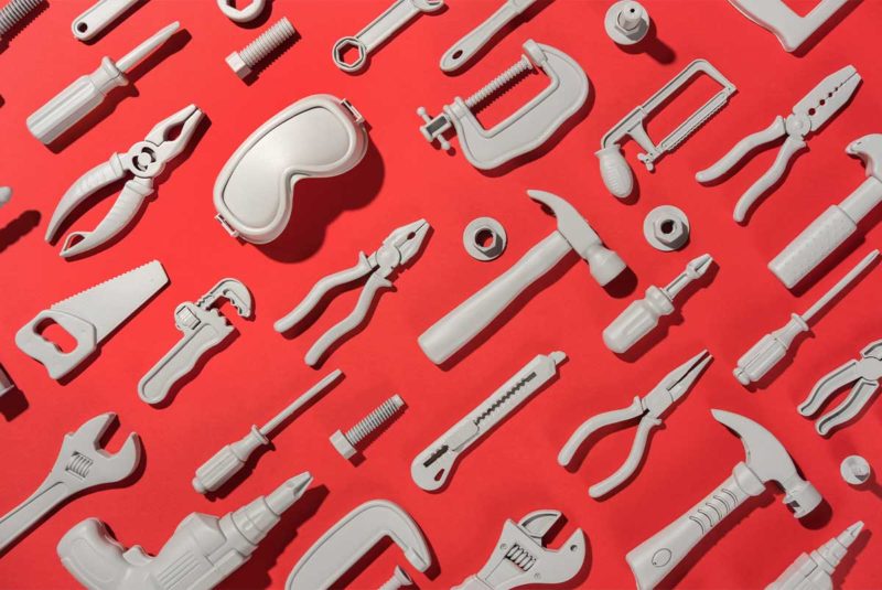 Tools on red background