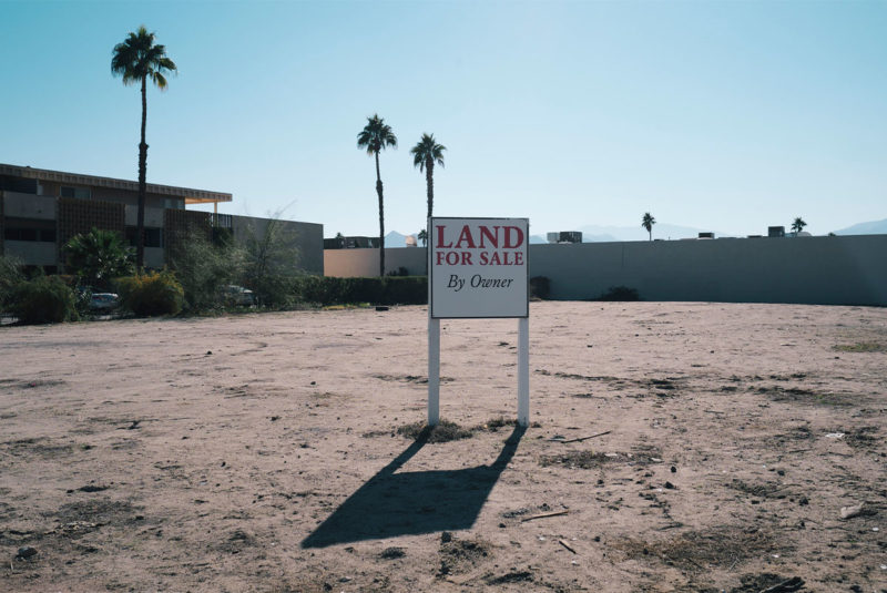 for sale sign on undeveloped land