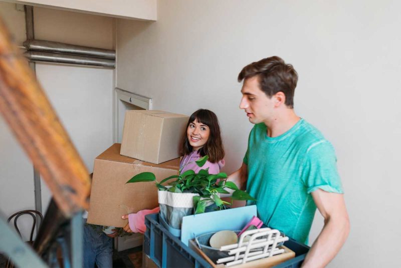 Young couple moving in