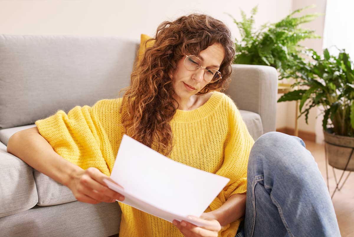 Woman looking at paperwork