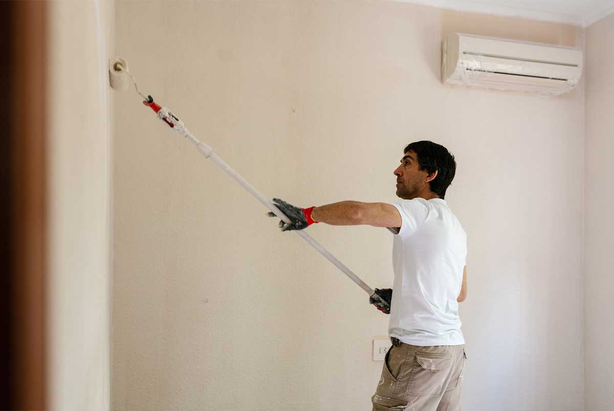 Man painting a wall